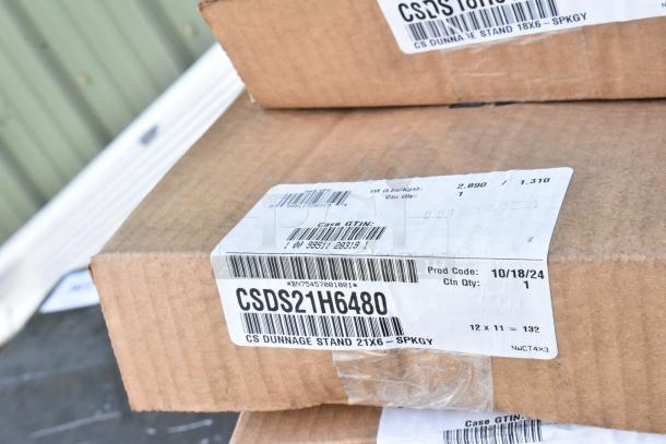 Box containing brand new Cambro CSDS21H6480 Camshelving Universal Dunnage Stand, 21'' x 6 1/2'', with product labels.