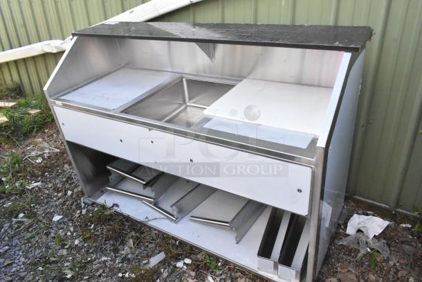BRAND NEW Regency 600PB63B 63" stainless steel bar, with ice bin, two removable speed rails; scratch and dent condition.
