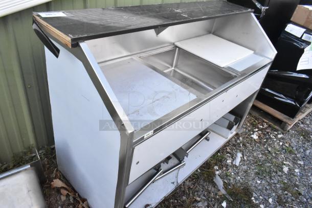 BRAND NEW Regency 600PB63B 63" stainless steel portable bar, scratch and dent, with two removable speed rails and ice bin.