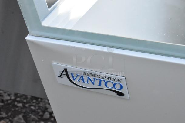 Brand new Avantco 193BCFD60W white bakery display case with LED lighting; visible nameplate. Scratch and dent condition.