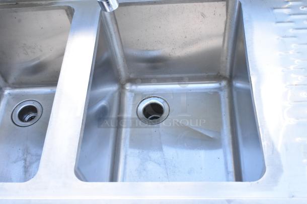 Stainless steel 3 bay back bar sink with right side drain board, faucet, and handles. Clean, durable condition.