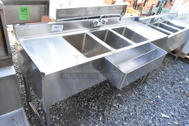 Stainless steel 3-bay back bar sink with dual side drain board, double speedwell, faucet, and handles.