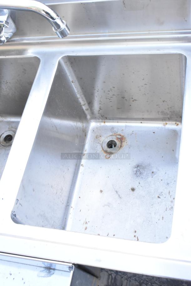 Stainless steel 3 bay back bar sink with dual side drain board, double speedwell, faucet and handles, in used condition.