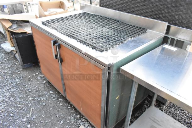 Duke SUBP-48 stainless steel 2-door worktop counter, wood panel doors, slightly worn condition, ideal for commercial use.