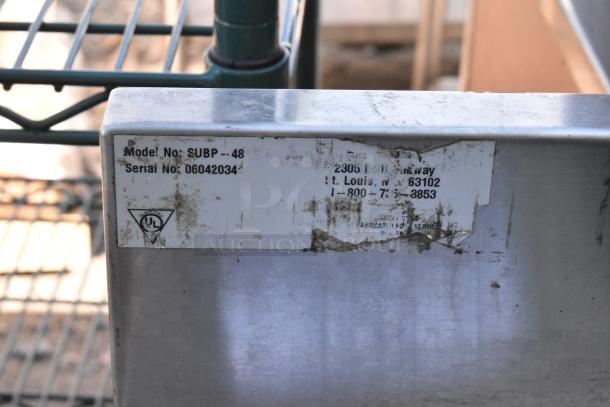 Duke SUBP-48 stainless steel commercial 2-door worktop counter, showing model and serial number on label.