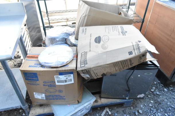 Pallet lot with SPT mini cooler, CTR64BD disposable bowls, napkins in open boxes. Some items appear unused.