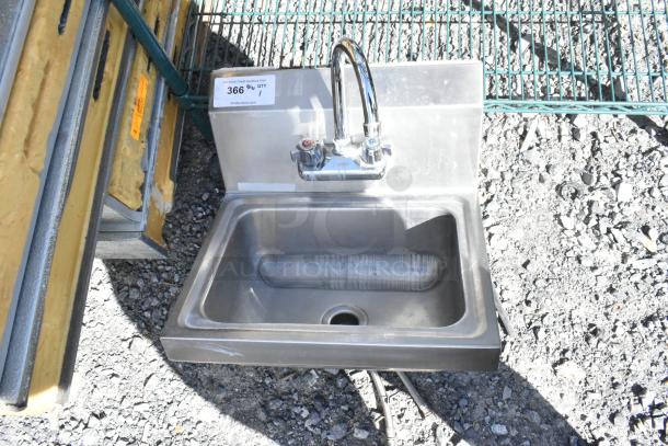 Stainless steel single bay wall mount sink with faucet and handles, in good condition, item tag "366".