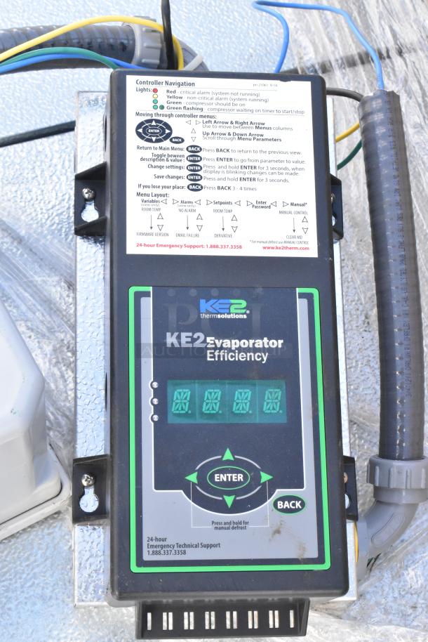 Norlake walk-in cooler controller panel with KE2 Evaporator Efficiency display and navigation instructions.