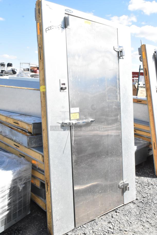 Norlake self-contained walk-in box with condenser, 1-phase, 208-230 volts. Used condition, stainless steel door, visible labels.