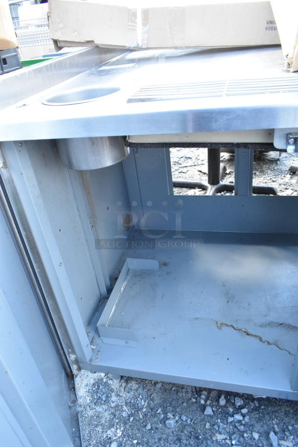 Duke SUB-BD-72-RM stainless steel soda station. Features include cup dispensing area and drainage surface. Good condition.