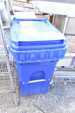 Brand new Lavex blue poly trash can, minor scratches and dents visible, sturdy build, suitable for outdoor use.