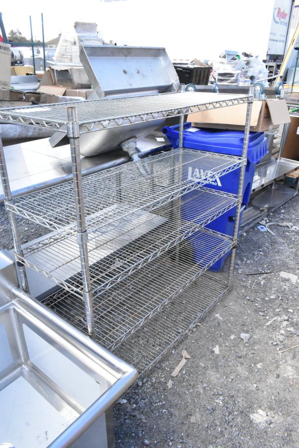 Chrome finish 5-tier wire shelving unit, sturdy condition. Buyer must dismantle. Consider freight charges.