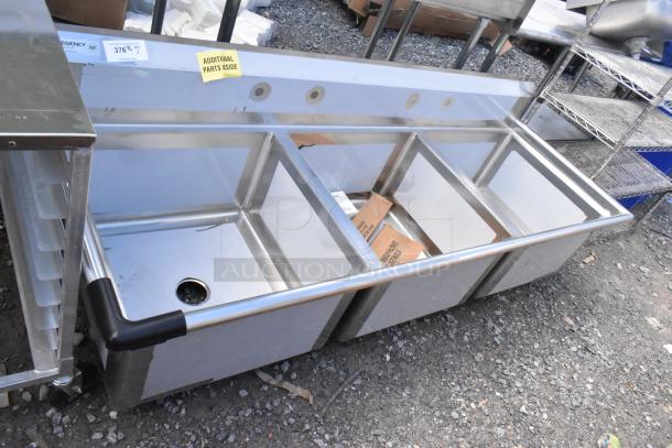 Brand new Regency 600S32424 stainless steel 3 bay sink with minor dents. Includes "Additional Parts Inside" label.