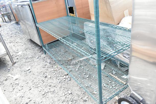 Green finish 5-tier wire shelving unit, sturdy metal construction, pre-owned condition. Buyer must dismantle.