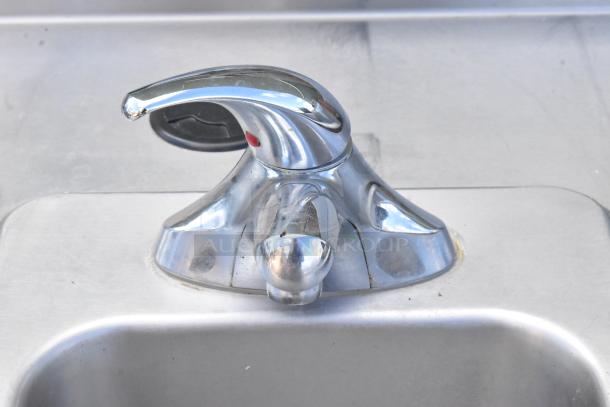 Duke SUB-PS-36-RM stainless steel counter with sink bay, features chrome faucet, model SUB-PS-36-RM, good condition.