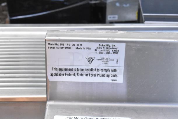 Duke SUB-PS-36-RM stainless steel counter with sink bay, shown with model and compliance labels. Made in USA.