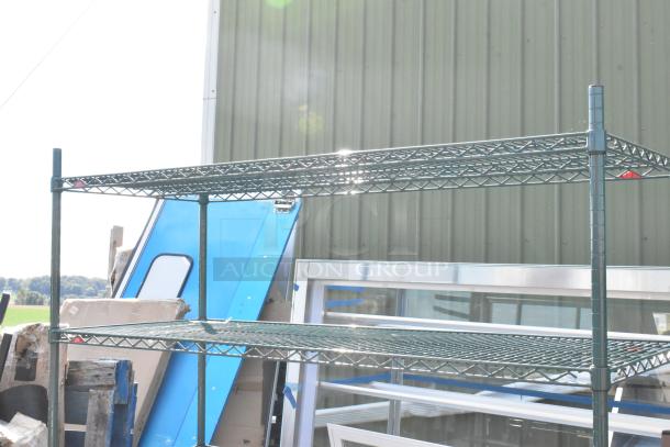 Green 5-tier wire shelving unit, sturdy design. Buyer must dismantle for shipping. Consider freight charges.