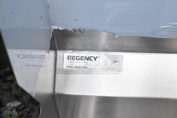 BRAND NEW Regency 600HS17KSS stainless steel sink with visible scratch and dent. Model and NSF label visible.