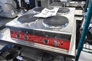 Brand new Avantco 177CER400 4-burner stainless steel countertop range, 208/240V, slight dent, French-style design.