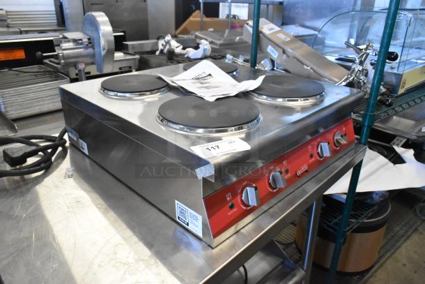 Brand new Avantco 177CER400 stainless steel 4-burner electric range, solid French-style, 208/240V, 1 phase, scratch and dent condition.