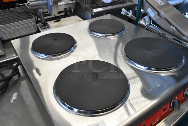 Avantco 177CER400 stainless steel 4-burner French-style electric range, 208/240 volts, new with minor dents.
