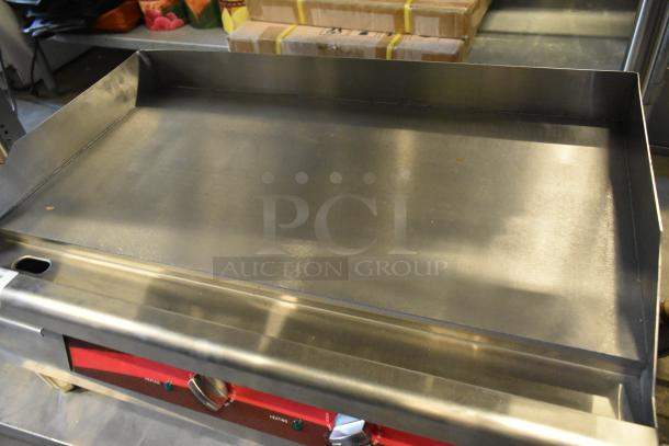 Avantco 177EG30N stainless steel 30" electric countertop griddle, new with minor scratches. Operates on 208/240 volts, 1 phase.