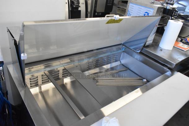 Alt text: 2025 Avantco 178APT48MHC stainless steel commercial prep table, new condition, scratch and dent, bain marie mega top, on casters.
