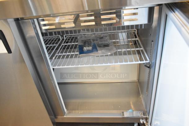 BRAND NEW Avantco 178APT48MHC stainless steel prep table, spacious interior, shelving, commercial casters, 115V, 1 Phase.