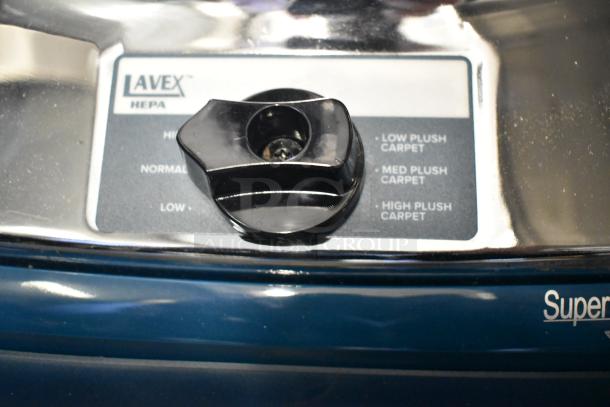 BRAND NEW Lavex 12" Upright Bagged Vacuum Cleaner with HEPA filter. Features multiple carpet settings. 120V, 1 Phase.