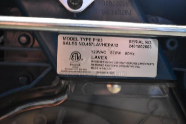 Label on Lavex 12" upright vacuum cleaner with HEPA filtration, model type P103, 120VAC 870W, serial no. 2401002883.