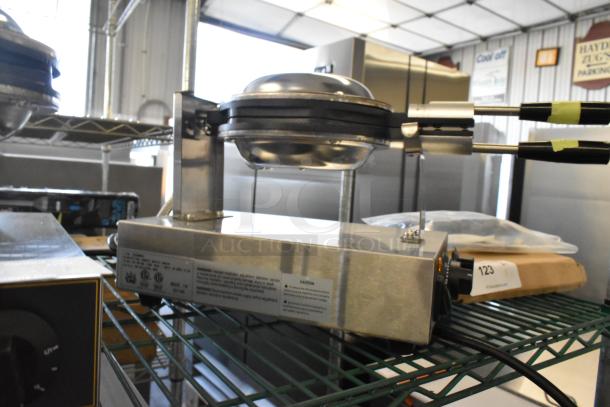 Brand new Carnival King 382BWM30 bubble waffle maker, non-stick, with timer, 120V, scratch and dent condition.