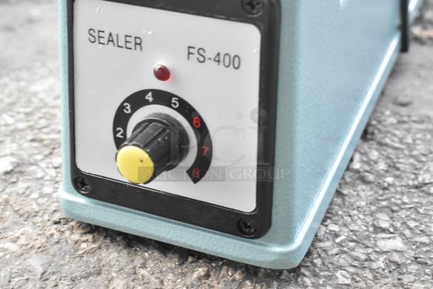 Galaxy Impulse Heat Bag Sealer FS-400 with timer, blue casing, 110V, 1 phase, scratch and dent condition, new.