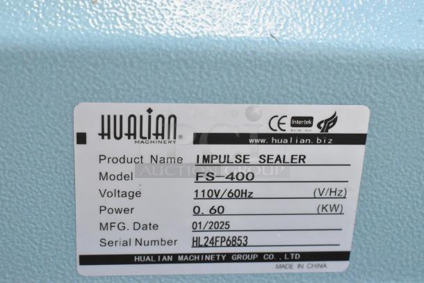 Hualian Impulse Sealer FS-400 label showing 110V/60Hz, 0.60KW, made date 01/2025, serial HL24FP6853, made in China.