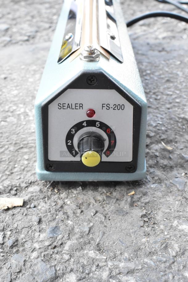 Galaxy Impulse Heat Bag Sealer FS-200, scratch and dent condition, with timer dial. 110V, 1 Phase, brand new.