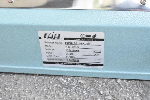 "Impulse Sealer FS-200 label, 110V/60Hz, 0.30KW. Mfg date: 01/2025. Serial: HL24FP6853, Hualian Machinery."