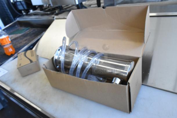 Boxed Avantco 178TOWERDBL 2 Tap Tower with 3" column, keg couplers, and hoses; new scratch and dent condition.