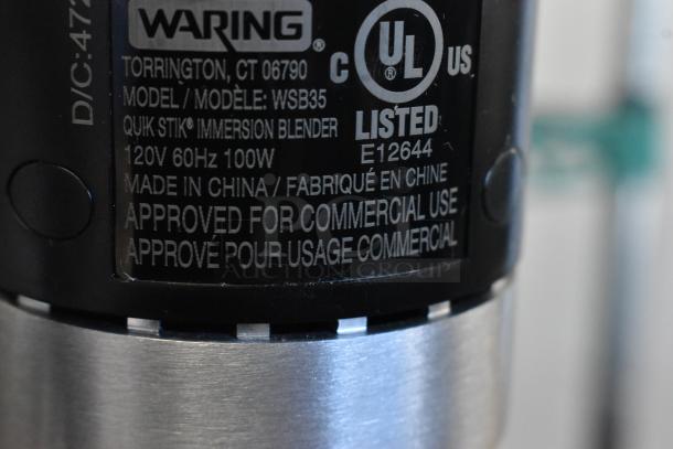 Close-up of Waring WSB35 immersion blender label showing model and specs. Approved for commercial use, 120V, 60Hz, 100W.