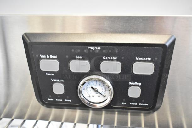 Control panel of Galaxy 177GVMC10P Chamber Vacuum Packing Machine with buttons for sealing, marinating, and vacuuming.