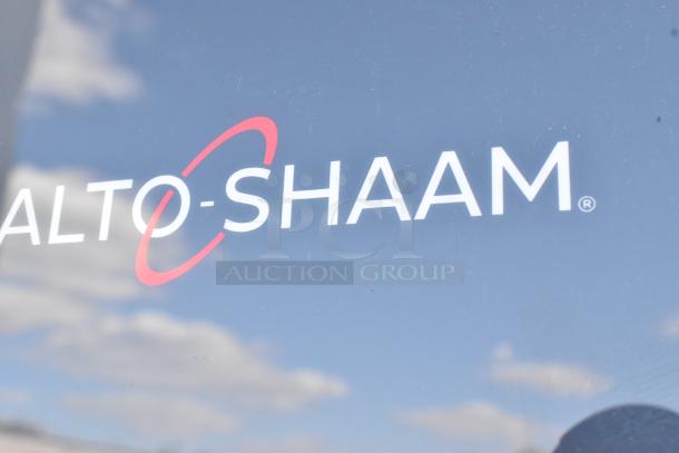 Alto Shaam logo against a clear sky.