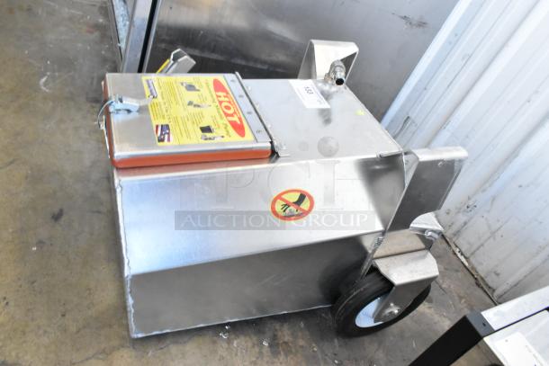 Stainless steel Shortening Shuttle SS-914-B commercial waste oil cart, visible label warns of hot surfaces.