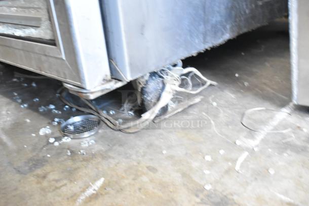 Hobart Q1 stainless steel cooler on casters, single door, visible broken glass, 115 volts, 1 phase, commercial use.