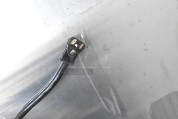 Hobart Q1 stainless steel cooler plug detail; single door, 115 volts, on casters; note broken glass.