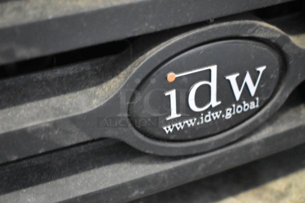 IDW GCG-10-F334B cooler logo close-up showing manufacturer's website, black background, minor dust visible.