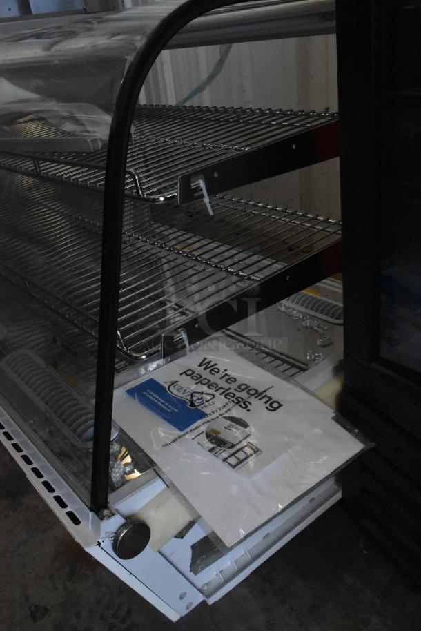 Brand new Avantco metal countertop display case merchandiser, missing both side panels, visible tags, scratch and dent condition.