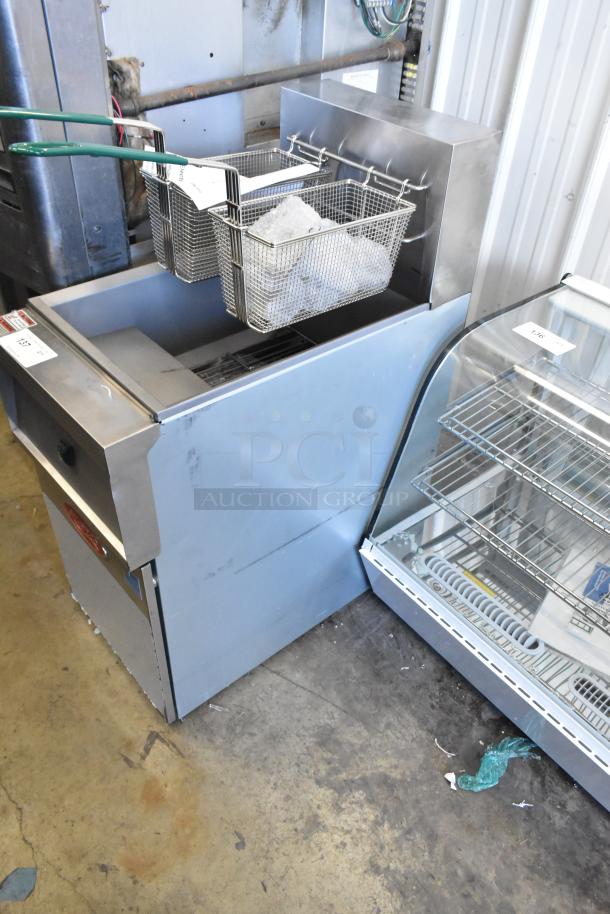 Brand new Avantco 177EF40D stainless steel electric fryer with 2 baskets, 240V, 1 phase, minor scratches.