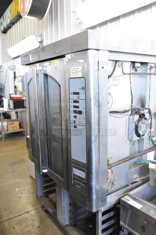 Baxter OV310G Stainless Steel Commercial Natural Gas Powered Mini Rotating Rack Oven on Double Pan Rack on Commercial Casters. - Item #1214110