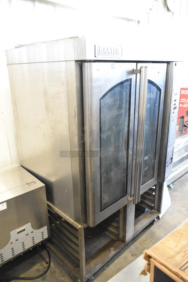Baxter stainless steel commercial natural gas mini rotating rack oven on double pan rack, on casters.