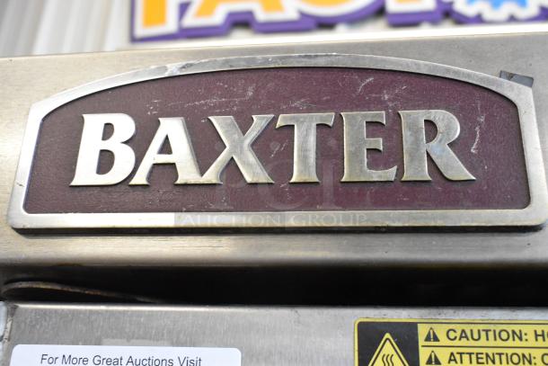 Baxter stainless steel commercial natural gas mini rotating rack oven, double pan rack, on commercial casters, brand logo shown.
