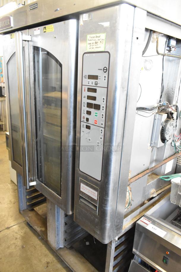 Baxter stainless steel commercial natural gas rotating rack oven with double pan rack on casters, visible control panel.