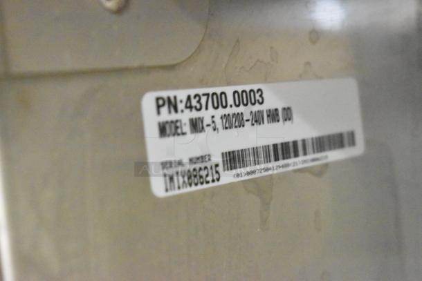 Bunn IMIX-5 stainless steel cappuccino machine with label showing model and serial number. 120/208-240V, 1 Phase.